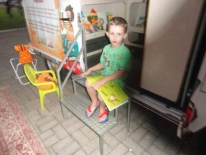 RODA DE LEITURA LEVA MORADORES PARA O MUNDO DA IMAGINAÇÃO EM EVENTO